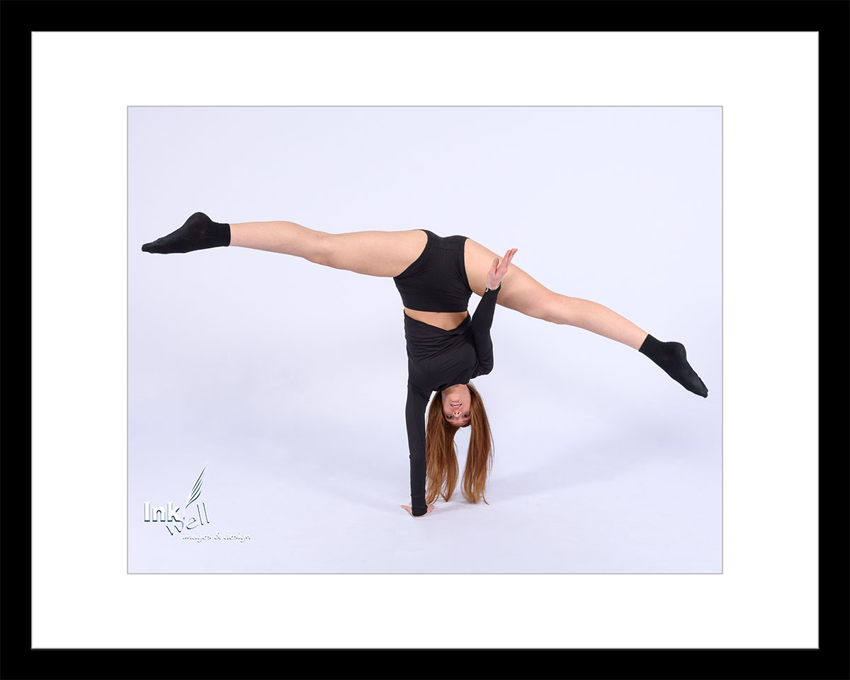 One hand, hand stand while doing the splits