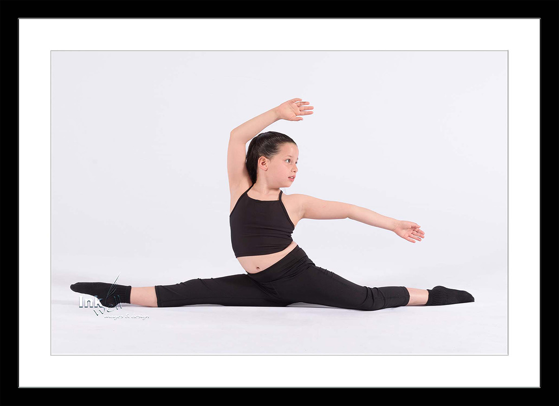 Young lady doing the side splits